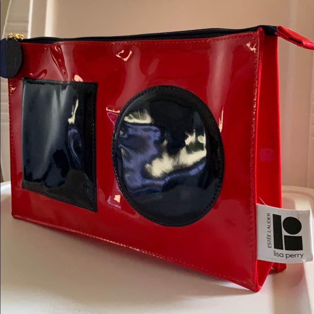 🆕 Estée Lauder by Lisa Perry makeup bag Red